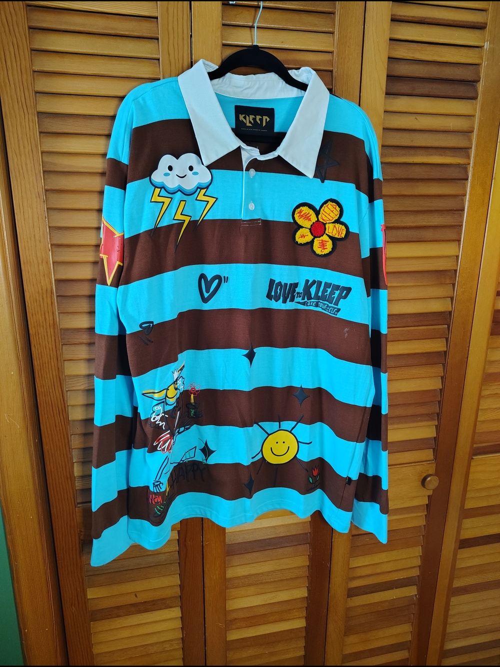 Kleep Women's Turquoise & Brown Striped Rugby Top with Graphic Patches